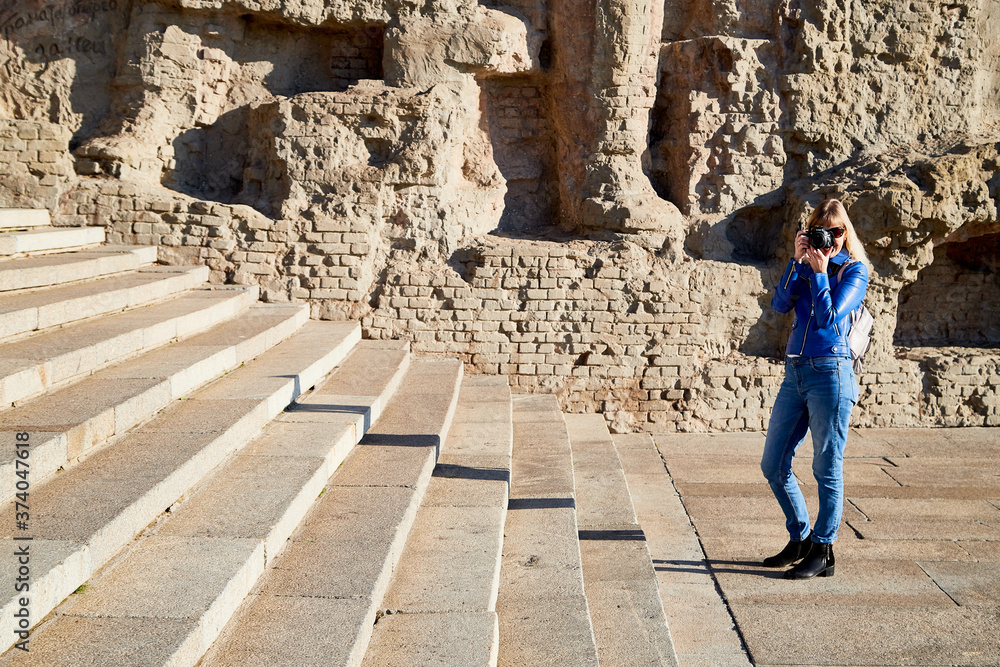Volgograd, Russia - October 18, 2019: Tourist in park of historical war complex Mamaev Kurgan in Volgograd, Russia. Volgograd, Russia - October 18, 2019: Tourist in park of historical war complex Mamaev Kurgan in Volgograd, Russia.