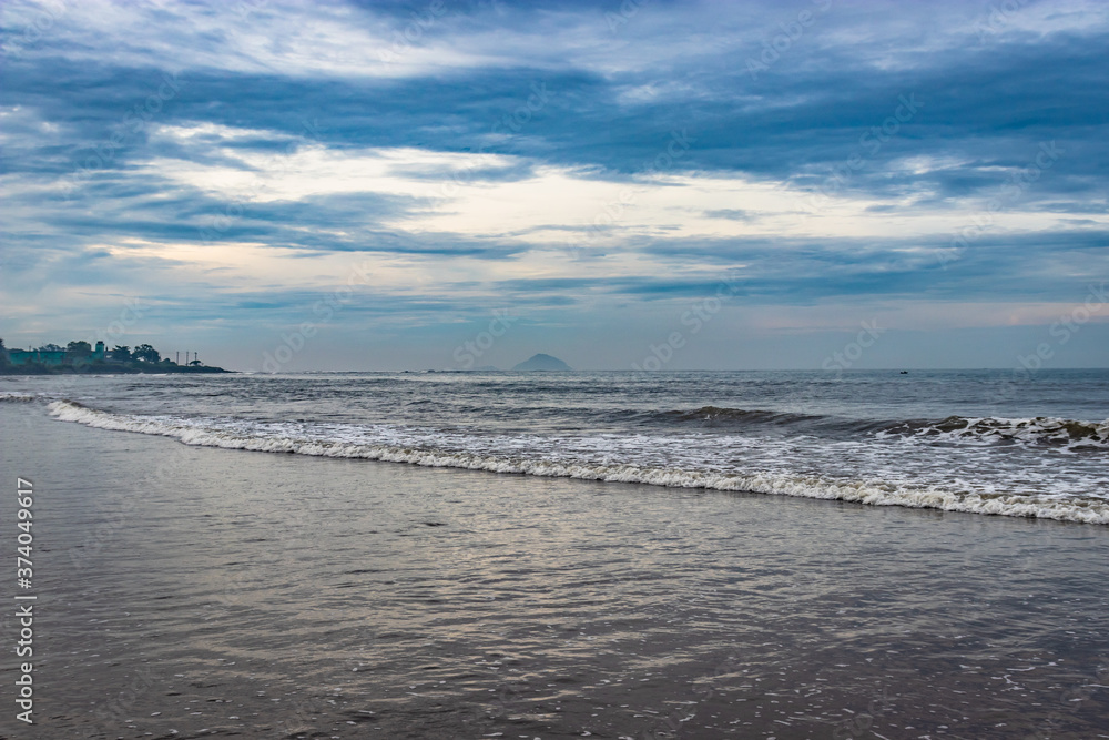 beach view with sea waves at early in the morning from low angle beach view with sea waves at early in the morning from low angle