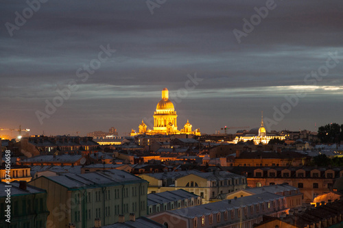 Saint Petersburg night rooftop cityscape with view on St Isaac's cathedral