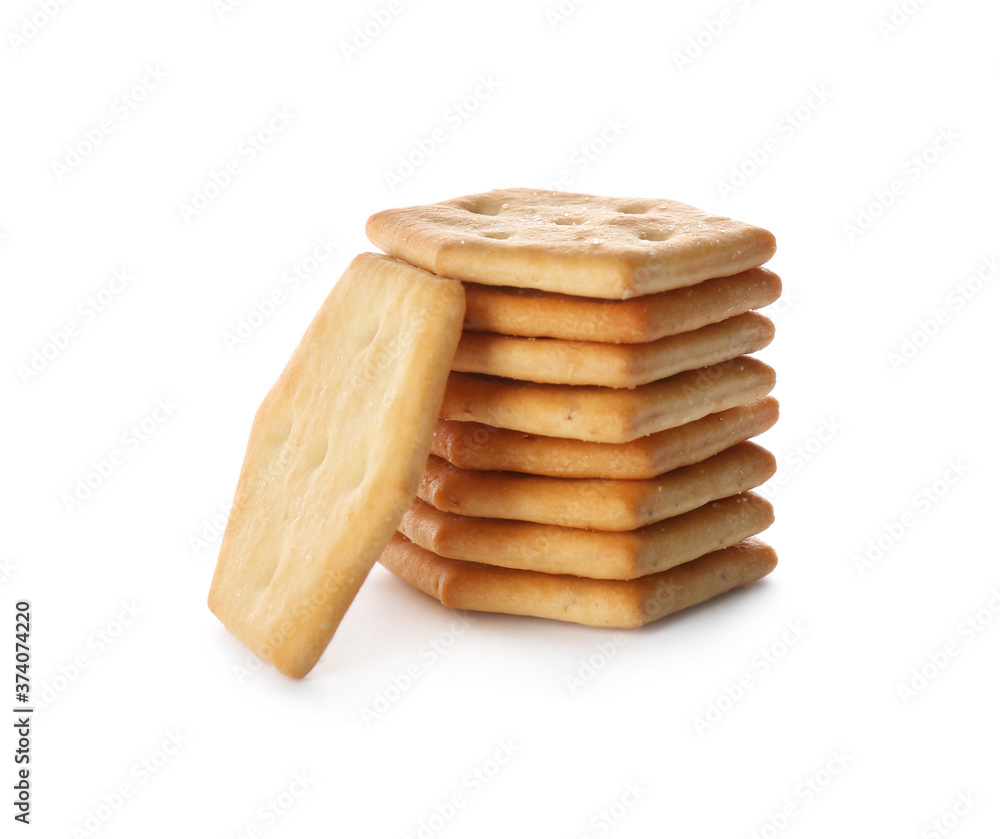 Stack of delicious crispy crackers isolated on white