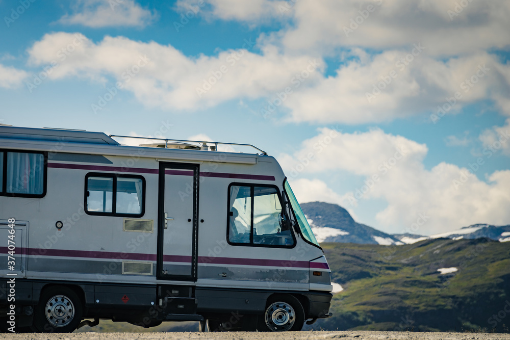 Camper car on roadside in norwegian mountains