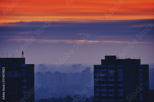 Sunset and storm clouds over the city. Kyiv  Ukraine.