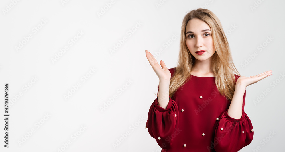 Portrait of confused beautiful girl with with long blonde hair, feels doubt while makes choice. Copy space Portrait of confused beautiful girl with with long blonde hair, feels doubt while makes choice. Copy space