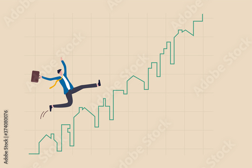 Real estate market price rising up chart, homebuyer or property investment concept, businessman homebuyer or real estate agent happy running on rising up house and building green graph and chart.