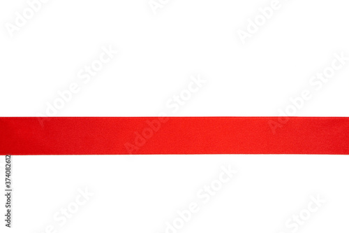 Shiny red ribbon isolated on white background.