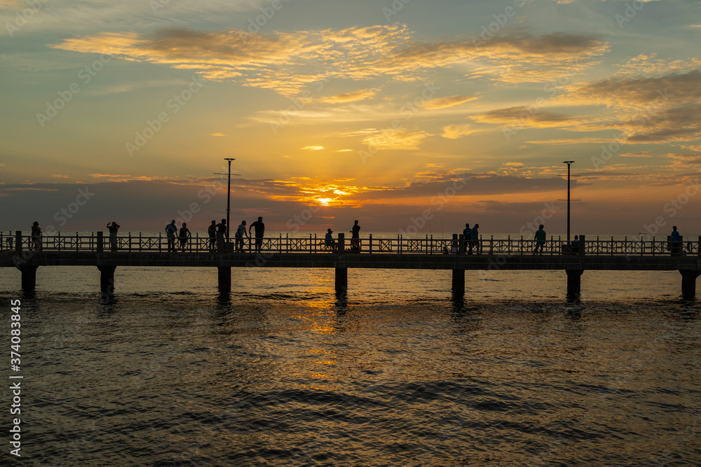 The silhouette of the pier