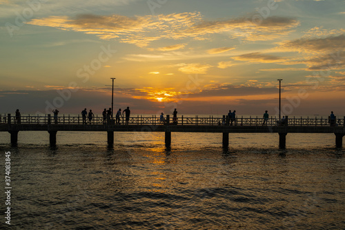 The silhouette of the pier