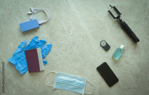Topview of marble table with protographer concept - photographic travel maintaining personal safety