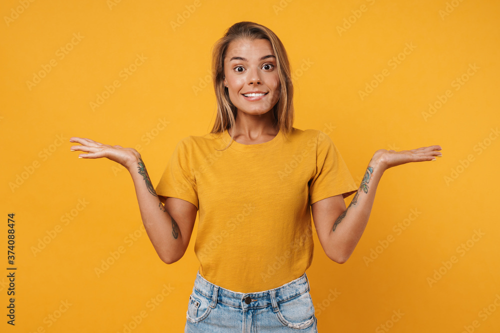 Image of nice delighted woman holding and showing copyspace Image of nice delighted woman holding and showing copyspace