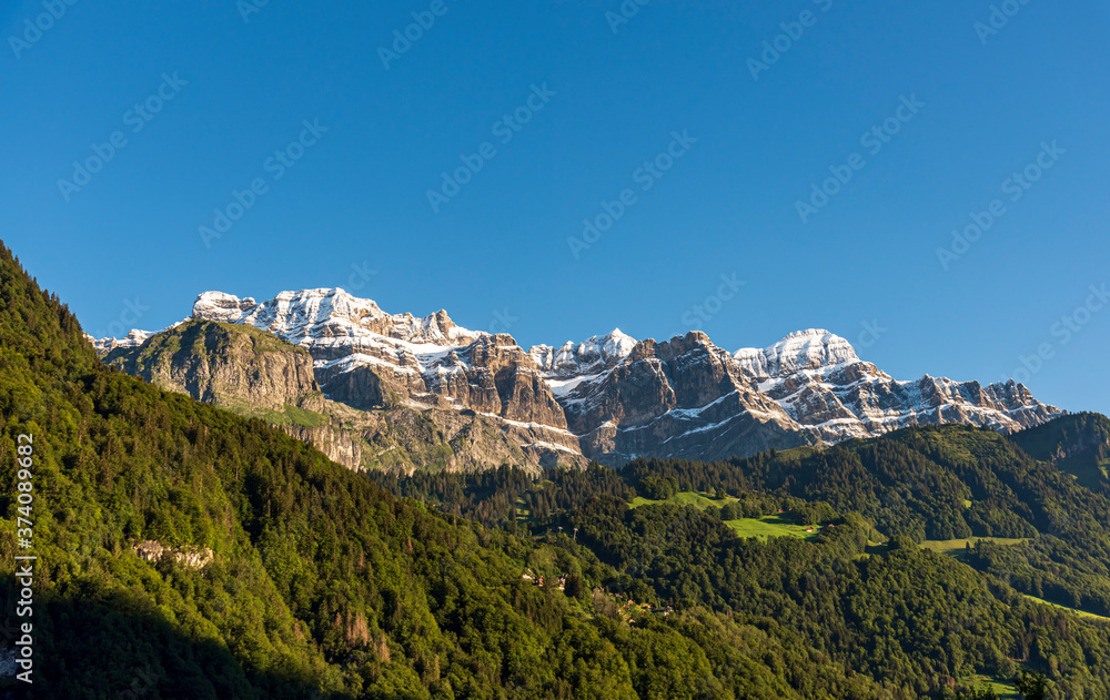 glärnisch mountain range landscape with blue sky
