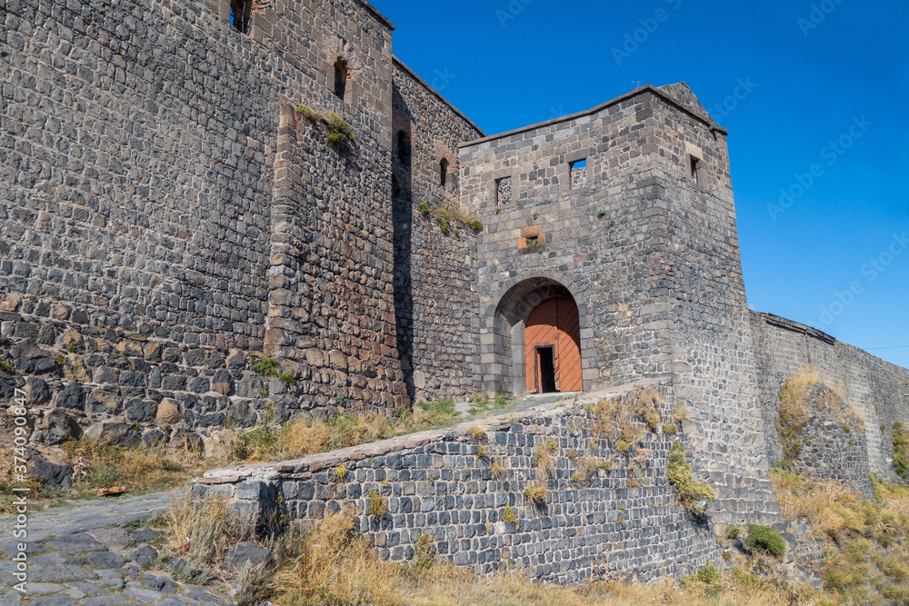 Main entrance to Kars Castle, Kars,Turkey. Fortress built in 1153 on top of almost impregnable rock. Walls of castle made of black basalt. Total length of perimeter about 3500 m.