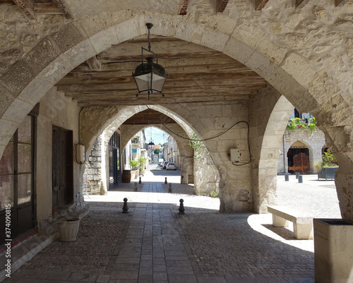 Arches in the bastide town of Eymet in France photo