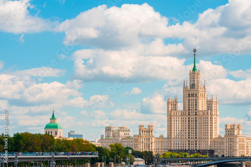 River bridge high-rise building blue sky. in Moscow