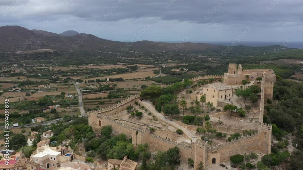 Flying a Fortress drone in the city of Capdepera on the northeast island of Majorca Spain Flying a Fortress drone in the city of Capdepera on the northeast island of Majorca Spain