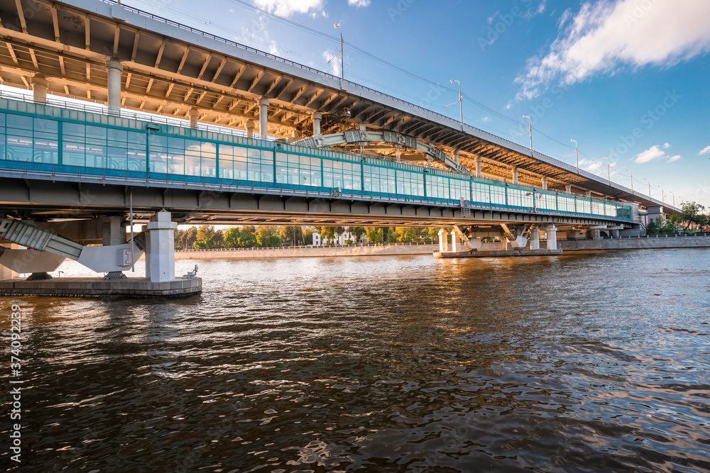 Bridge over the river in the sunset rays in Moscow Bridge over the river in the sunset rays in Moscow