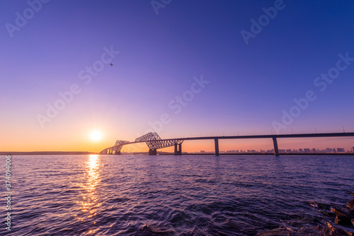 Wallpaper Mural 東京ゲートブリッジの夕景 / Evening view of "Tokyo Gate Bridge". An airplane heading for Haneda Airport passes over the bridge. Koto, Tokyo, Japan. Torontodigital.ca