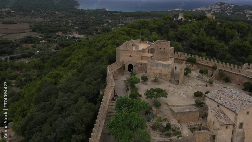 Flying a Fortress drone in the city of Capdepera on the northeast island of Majorca Spain Flying a Fortress drone in the city of Capdepera on the northeast island of Majorca Spain