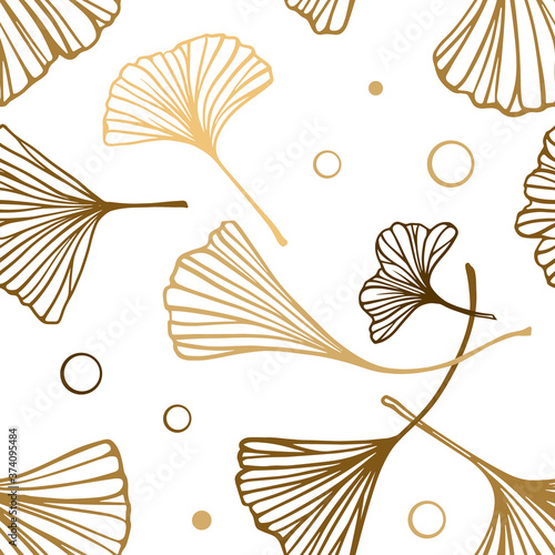 Golden ginkgo leaves seamless pattern on a white background.