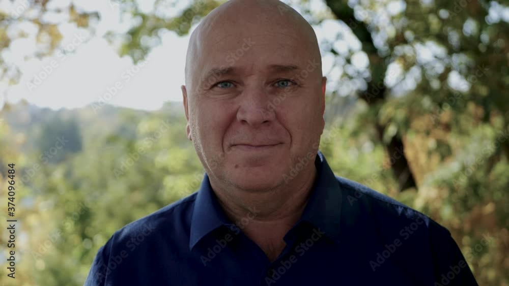 Portrait with a Man on the Street Looking to Camera and Smiling Happy Portrait with a Man on the Street Looking to Camera and Smiling Happy