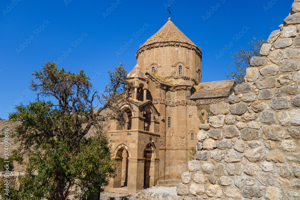 Medieval Armenian Cathedral of Holy Cross & its park, Akdamar island, Van Lake, Gevaş Turkey. Walls are richly decorated by bas-reliefs from Bible & Gospel. It's built in 921 & it's still masterpiece