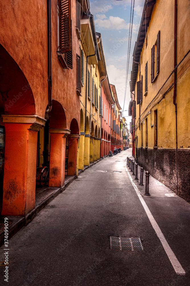 Fototapeta premium Portrait view of a colorful street in Bologna, Italy.