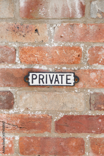 Rural Private sign on brick wall
