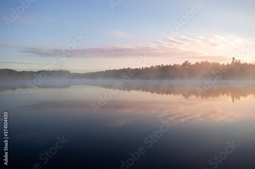 Calm morning water reflection in the Schoenramer Filz Moor  South Germany