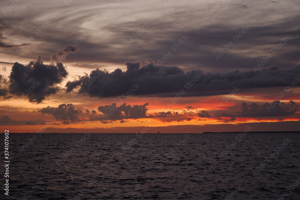 Naklejka premium sunset over the sea