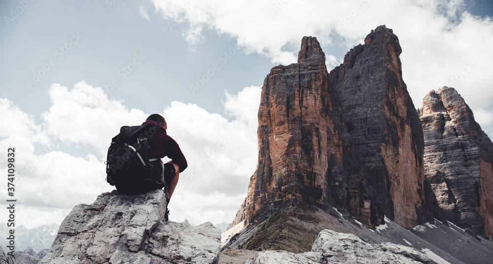 man on the top of a mountain