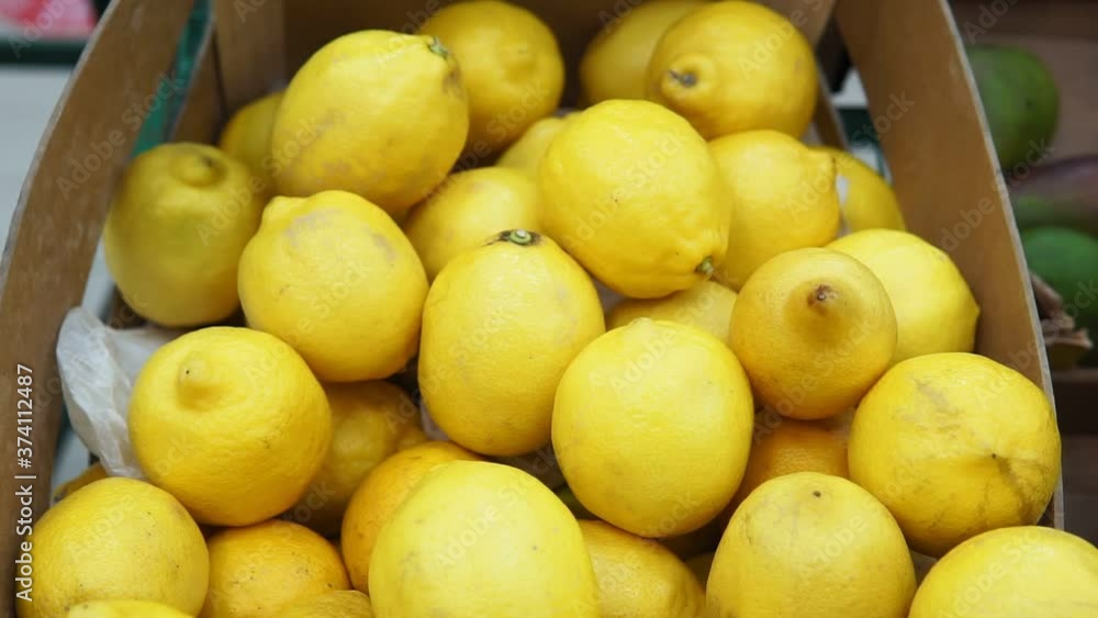 lemons background selling fruit at the market lemons background selling fruit at the market