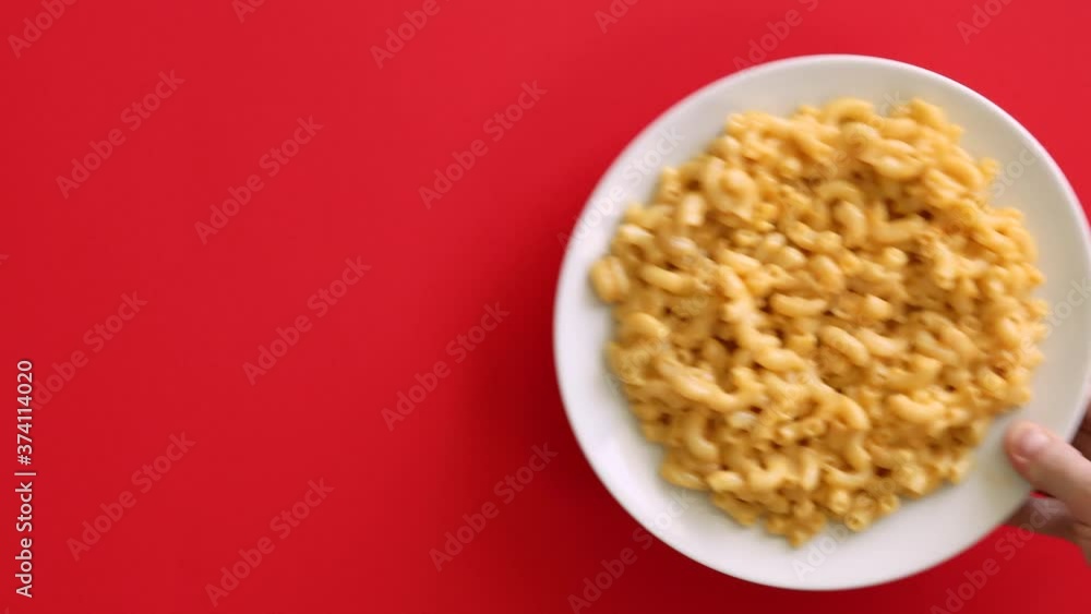Serving a Plate of Macaroni and Cheese Serving a Plate of Macaroni and Cheese