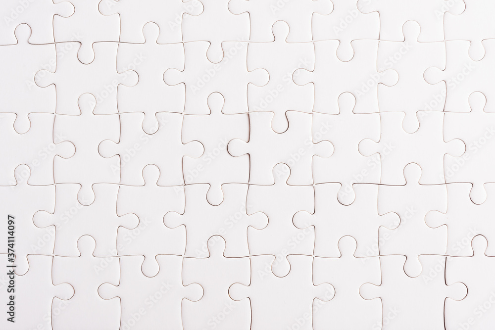 Top view flat lay of paper plain full white jigsaw puzzle game texture background, quiz calculation concept