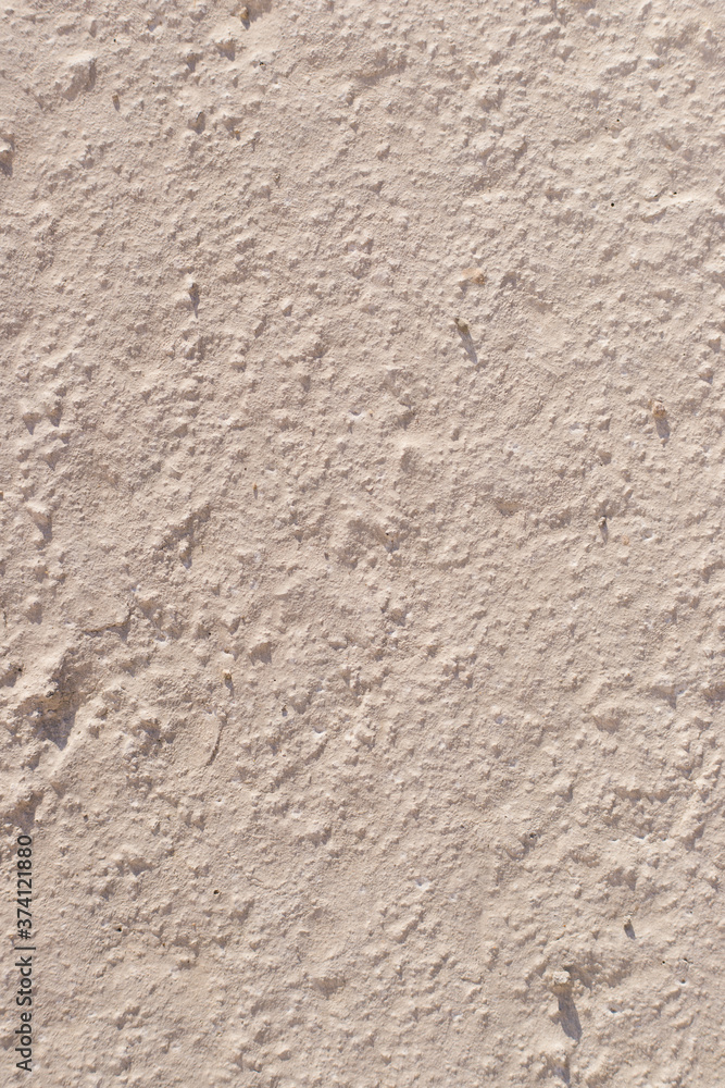 Concrete grey background. The texture of the concrete and putty.Grey uneven floor. Concrete grey background. The texture of the concrete and putty.Grey uneven floor.