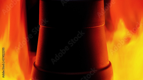 Metal cone on red background