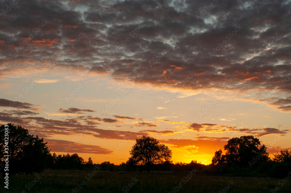orange sunset over the river. sunset over the river. beautiful warm summer red sunset orange sunset over the river. sunset over the river. beautiful warm summer red sunset