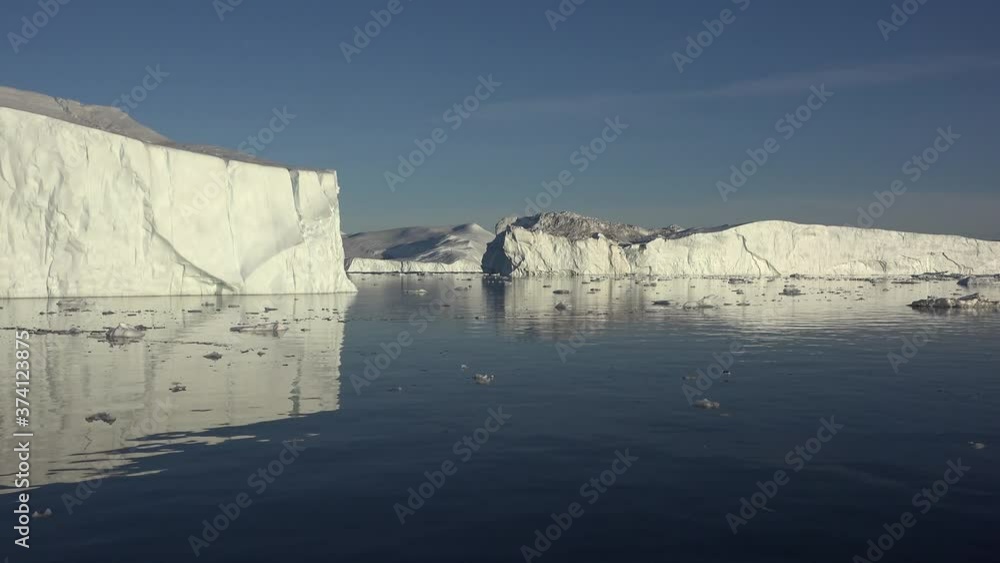 Antarctica floating sea ice glaciers and mountains reflections Antarctica floating sea ice glaciers and mountains reflections