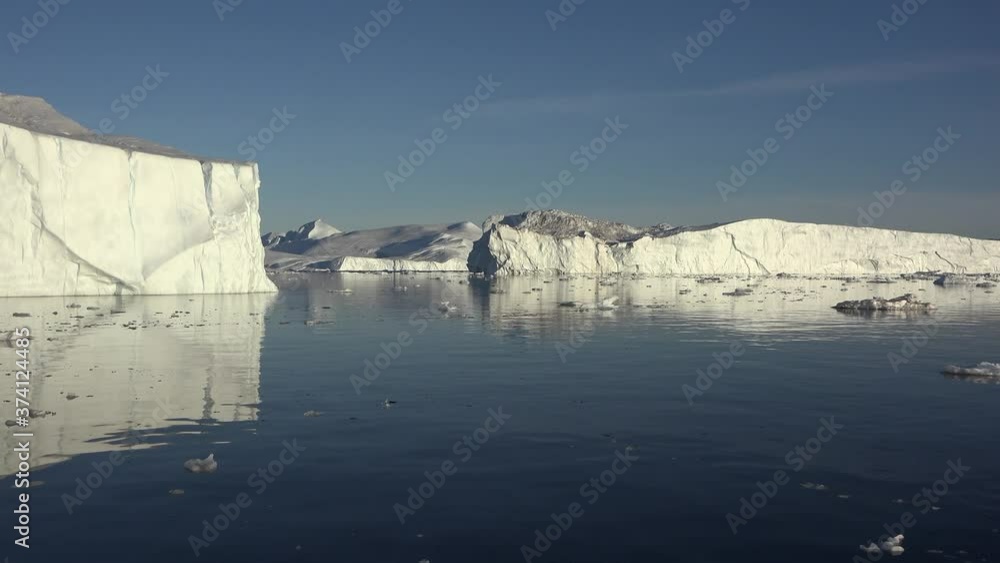 Antarctica floating sea ice glaciers and mountains reflections Antarctica floating sea ice glaciers and mountains reflections