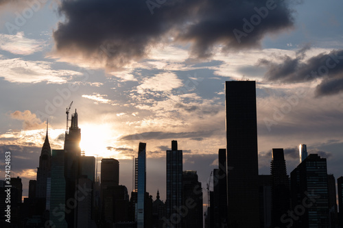 Beautiful Silhouettes of Skyscrapers in the Midtown Manhattan Skyline during a Sunset in New York City