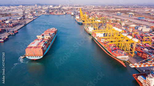 Cargo containers ship logistics transportation Container Ship Vessel Cargo Carrier. import export logistic international export and import services export products worldwide © Photo Gallery