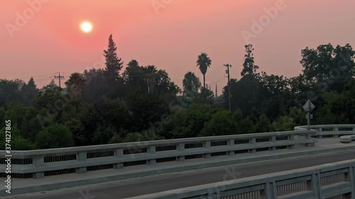 Winters, California, USA. 22 August 2020.  Town covered in smoke due to the wildfire at sunset. LNU Lightning Complex Fire that ravaged the Napa, Sonoma, Lake and Solano counties. photo