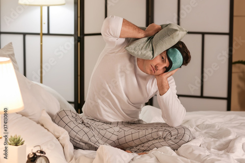 Young man suffering from in...