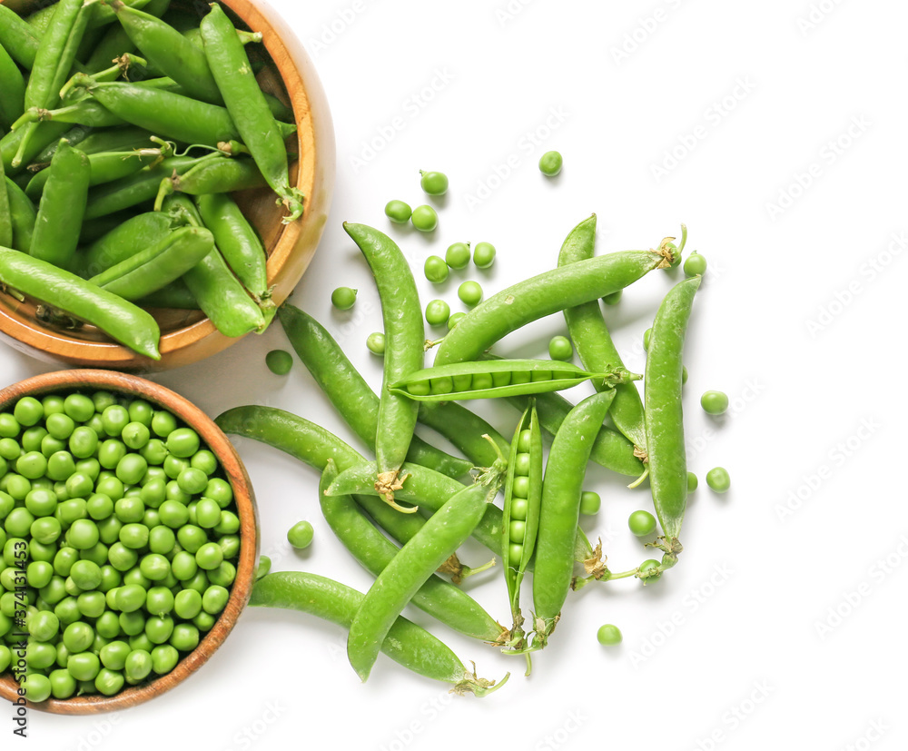 Bowls with tasty fresh peas on white background Bowls with tasty fresh peas on white background