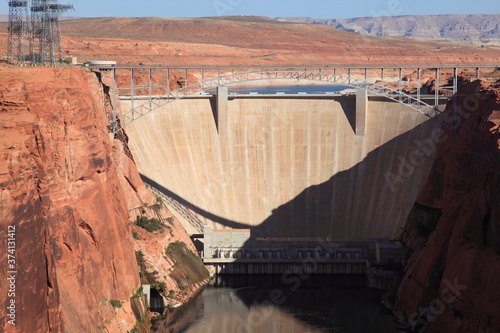 View of Glen Canyon Dam and bridge with Colorado River near the town of Page in Arizona USA