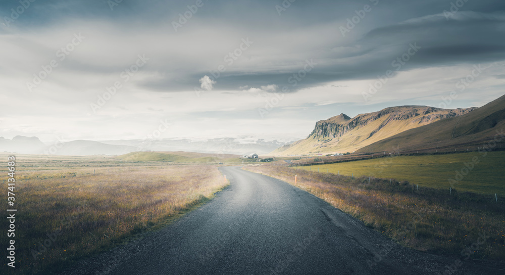 Icelandic landscape with asphalt road
