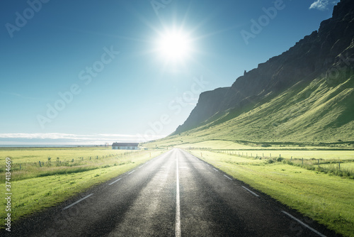 sunny road in summer Iceland