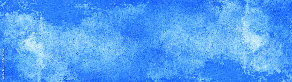Abstract  blue watercolor painted paper texture background banner wide panorama blue sky 