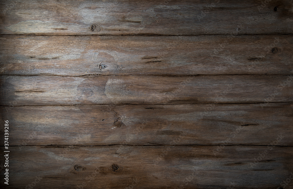 Wooden brown textured rustic table surface
Wooden brown textured rustic table surface
