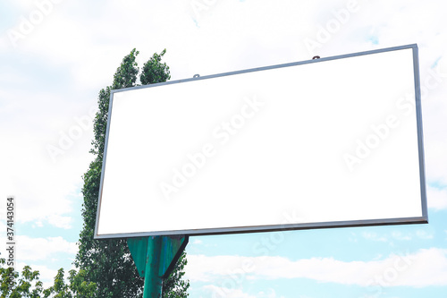 Blank advertising billboard on city street