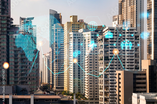 Research and development hologram over panorama city view of Bangkok, hub of new technologies to optimize business in Asia. Concept of exceeding opportunities. Double exposure.