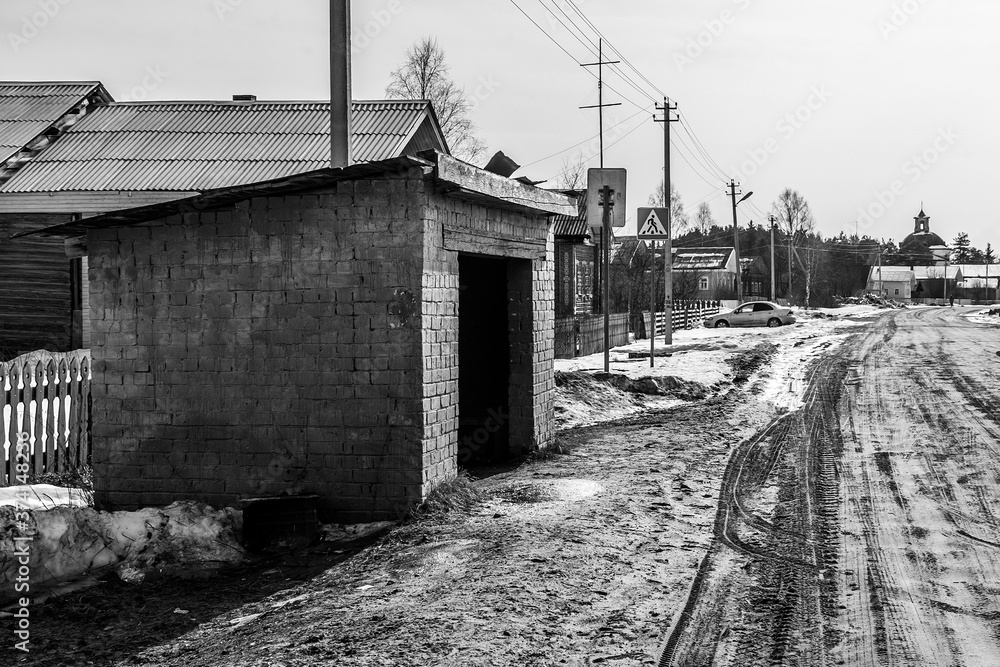 old soviet bus stop in winter village